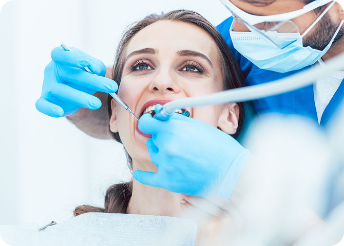 Female patient getting preventive dentistry treatment on monday